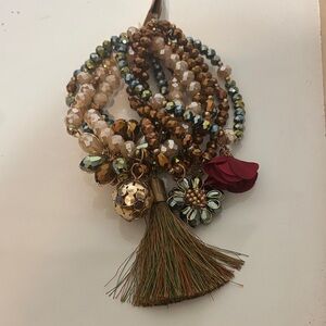 Bach Beaded set of 7 stretch bracelets with charms. NWT